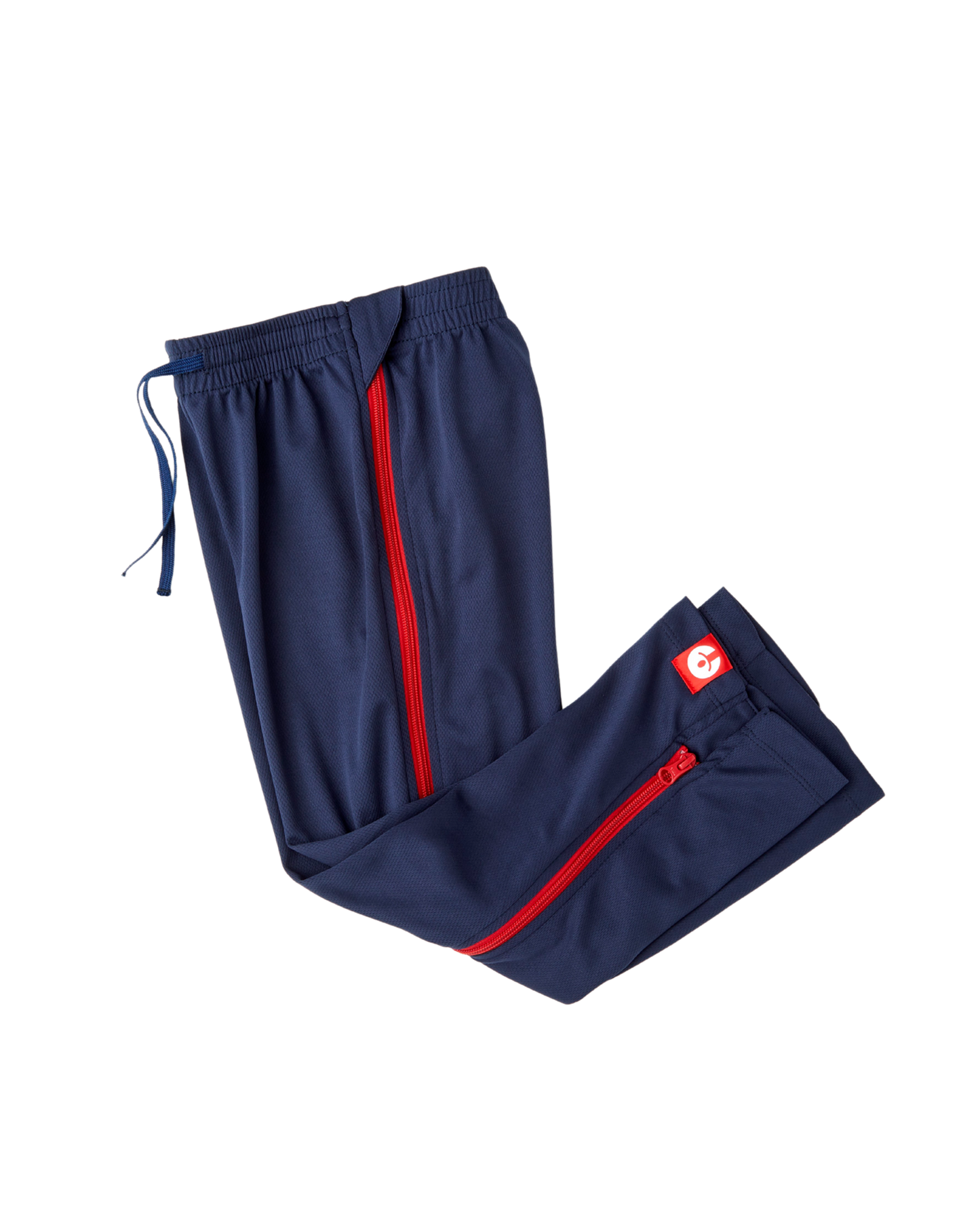 Navy blue tracksuit pants with red zippers on a white background