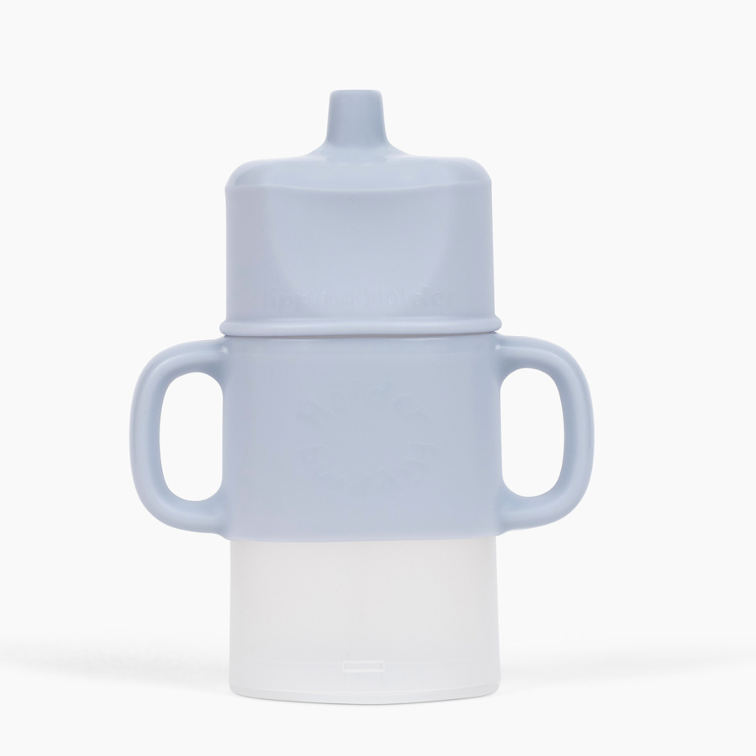White toddler sippy cup with flip top and side handles