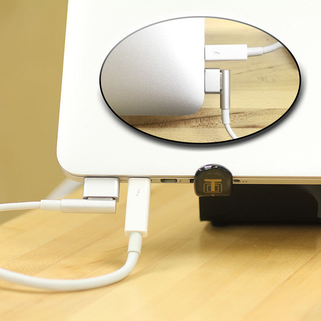 White fixed-angle iPad stand with cable management pass-through and clamp
