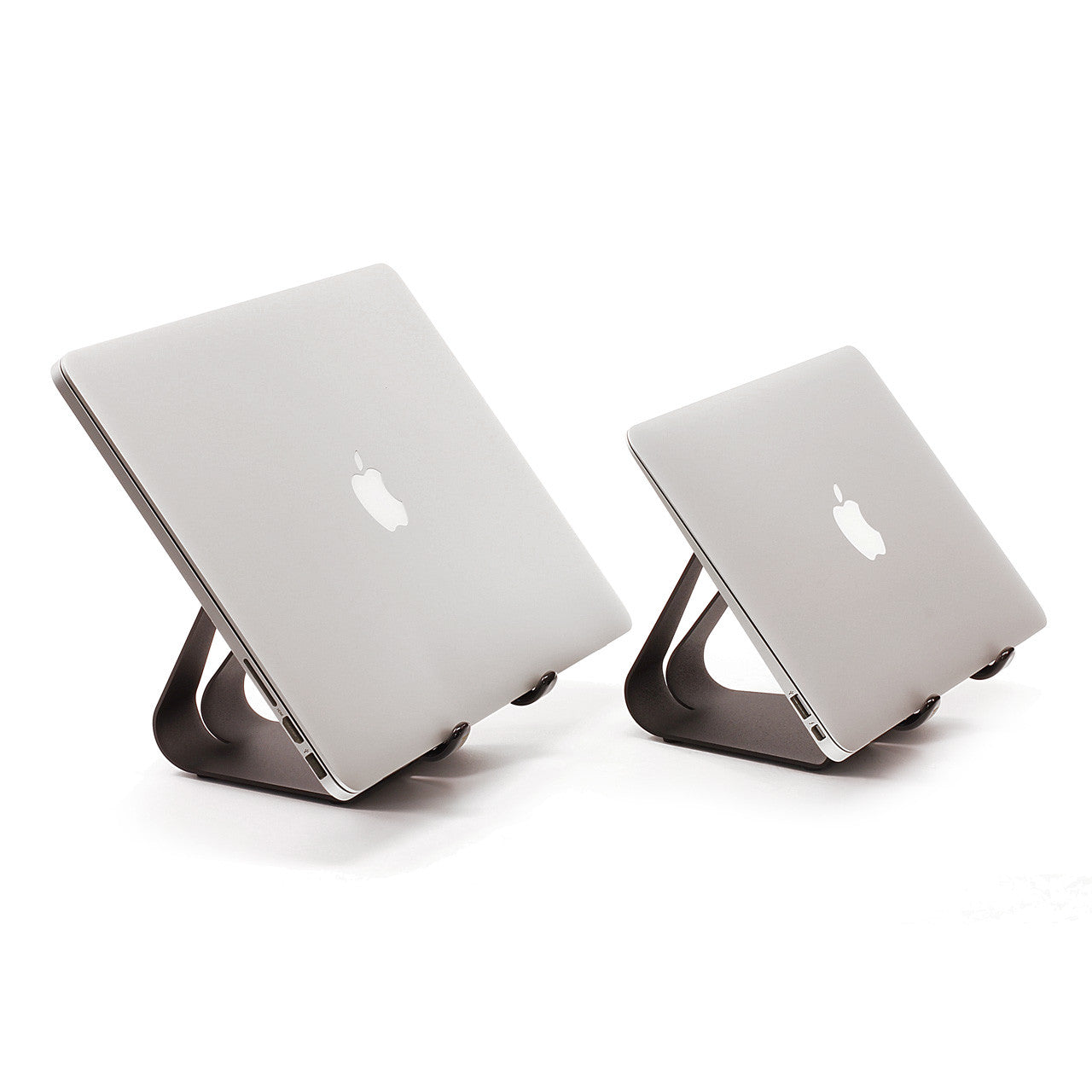 Compact fixed-angle stand holding a tablet with dark cradle supports