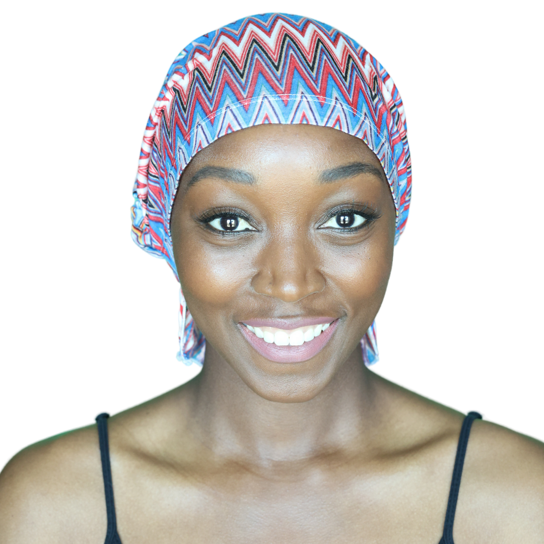 Chevron knit beanie with blue, red, and white zigzags, snug fit on head