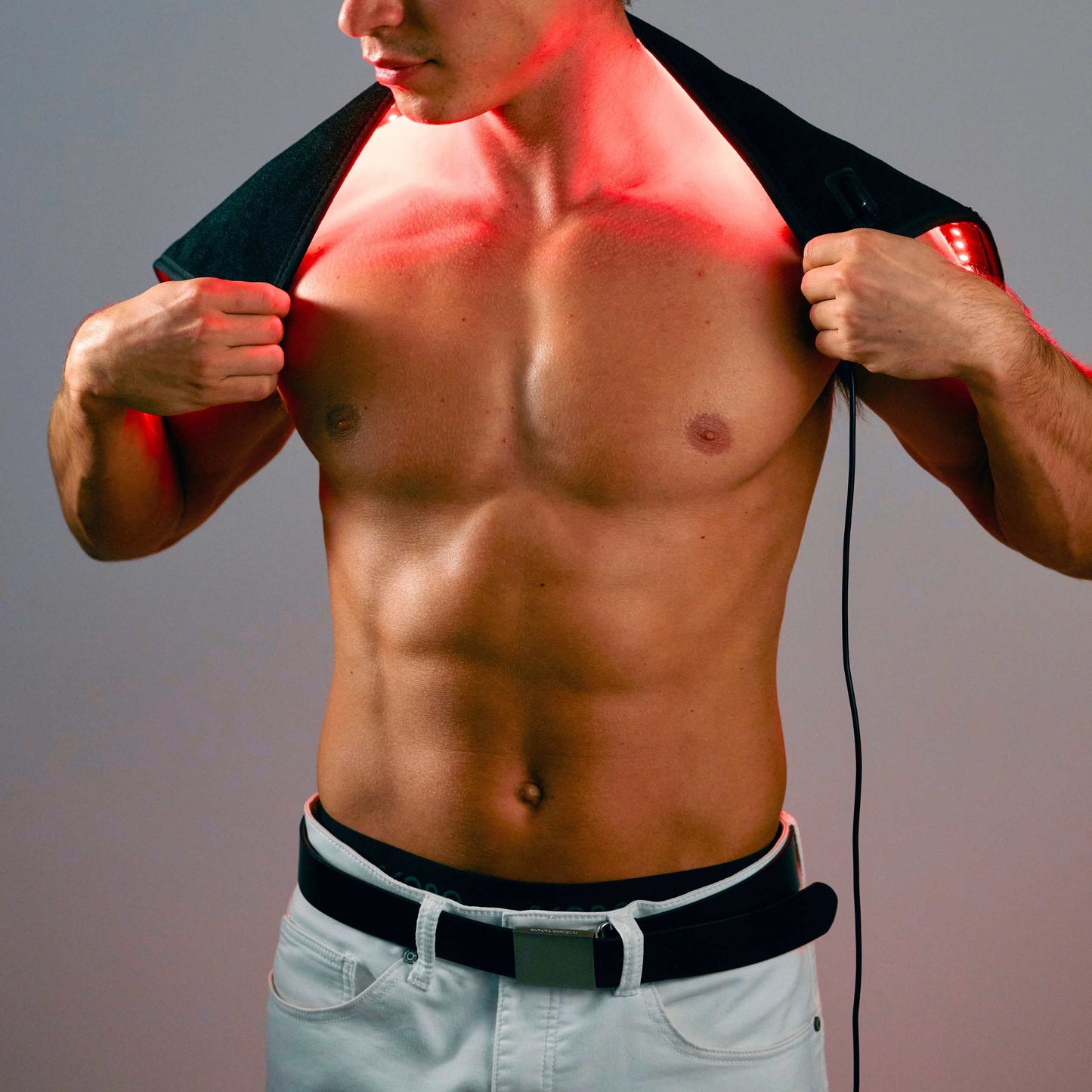 Lumara pad with red LED light panel against the lower torso