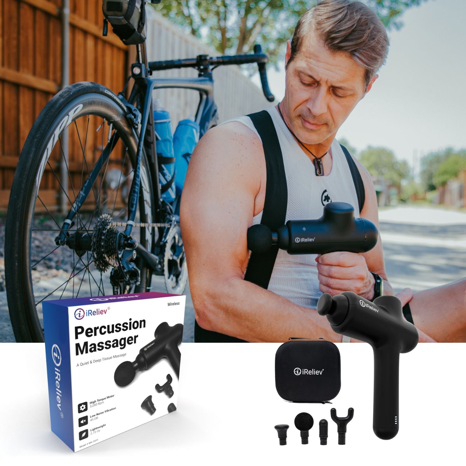 Black percussion massage gun with attachment heads and carrying case beside product box