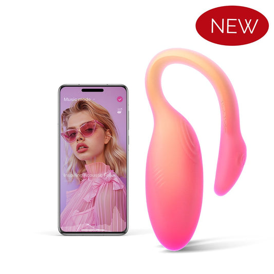 Pink flamingo-shaped personal massager with curved handle