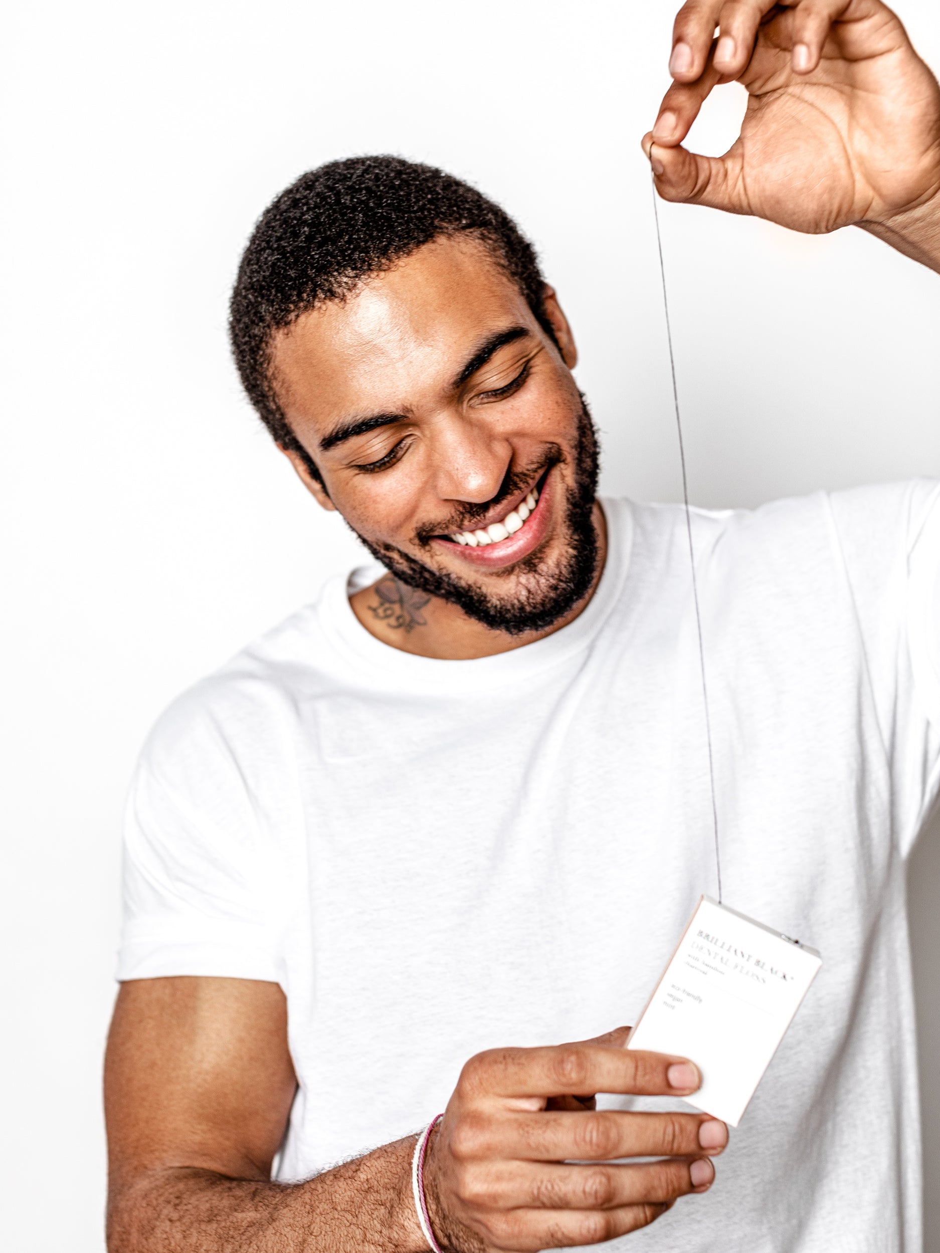 Brilliant Black® Floss – Whitens Between Teeth Naturally Terra & Co.