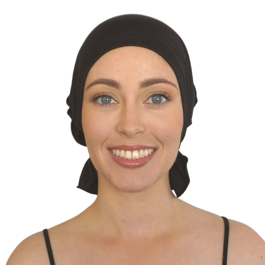 Black chemo beanie hat with smooth fabric and elastic edge