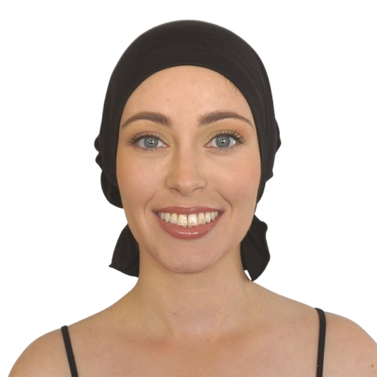 Black chemo beanie hat with smooth fabric and elastic edge