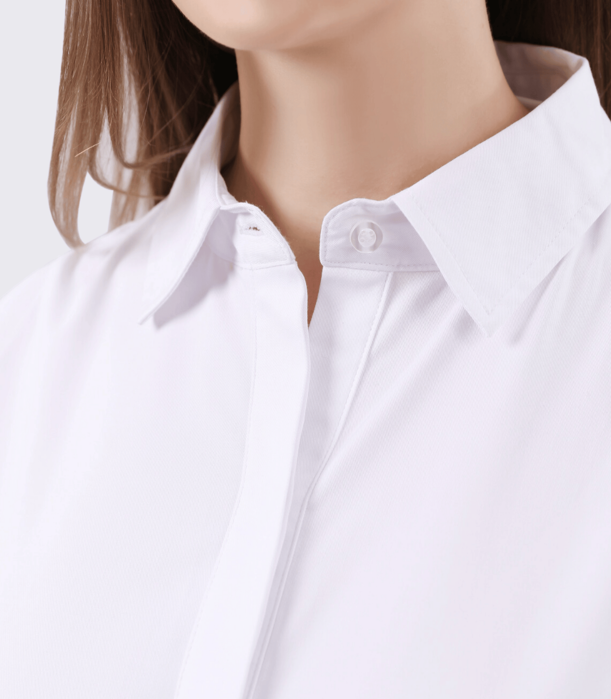 Close-up of a white shirt with a blurred background