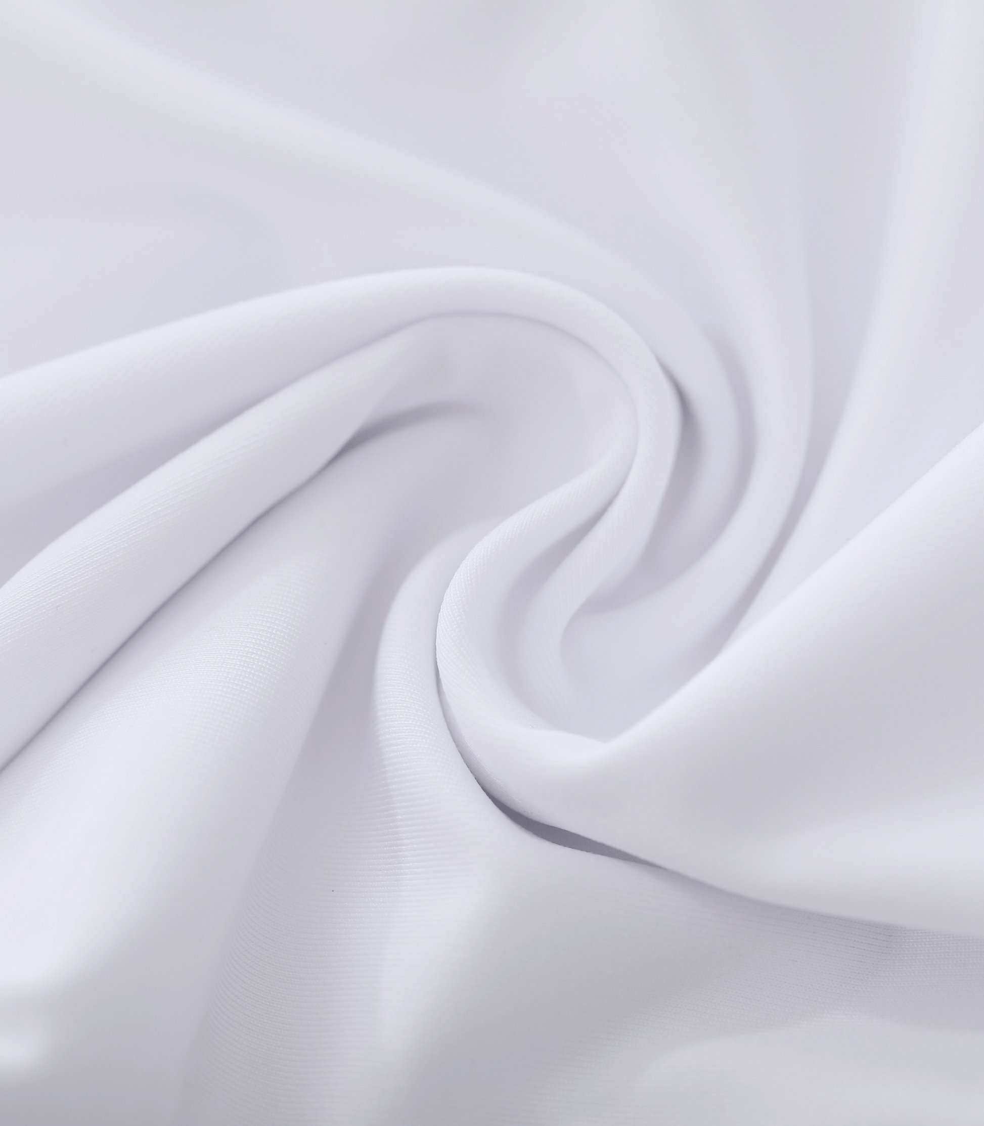 Close-up of white fabric with folds
