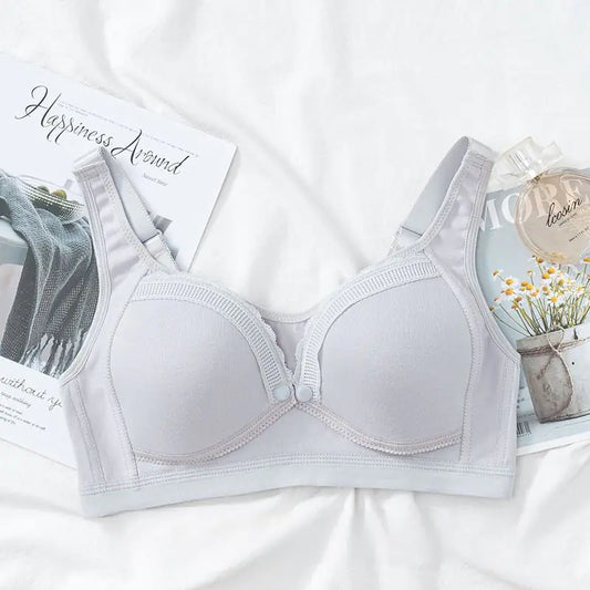 Grey front-buckle nursing bra with molded cups and adjustable shoulder straps