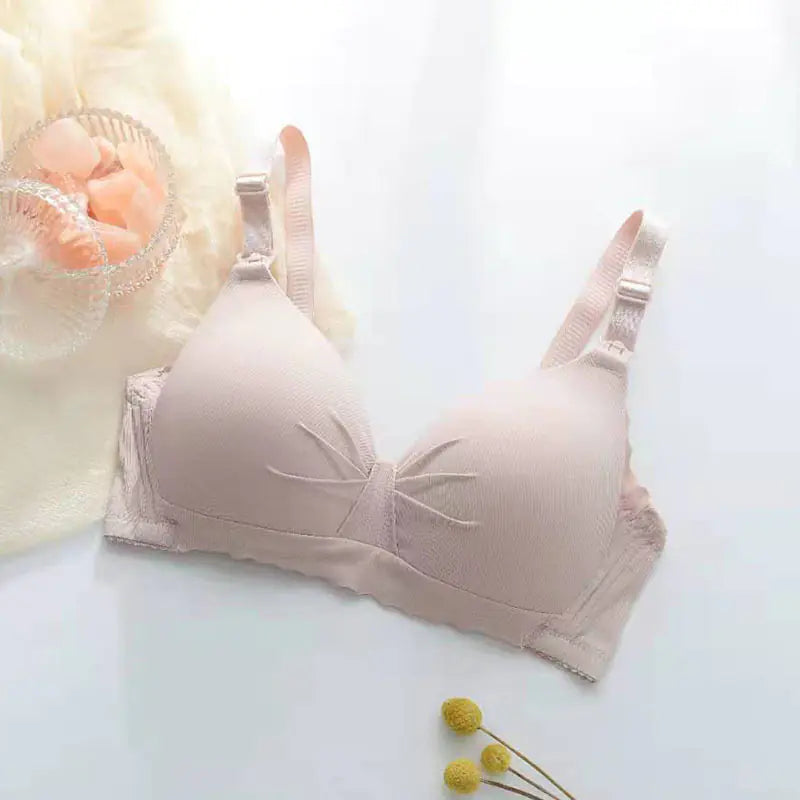 Maternity nursing bra in light nude pink, adjustable straps and front nursing clasp