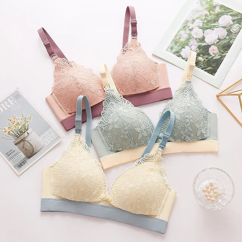 Maternity lace bras in beige, pink, and green with lace cups and wide underband