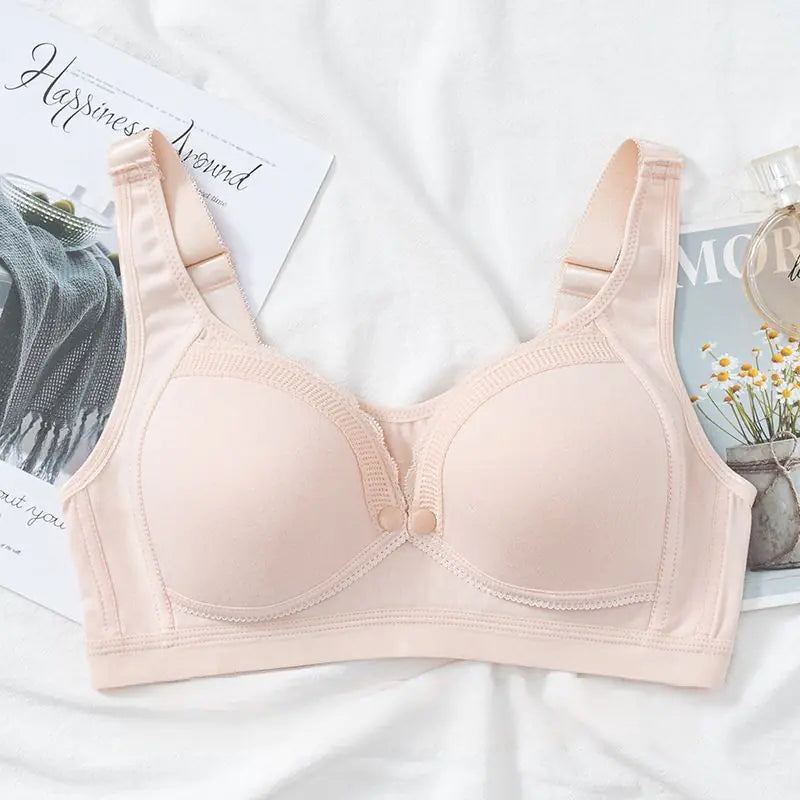 Beige cotton nursing bra with front-center buckle and molded underwire cups