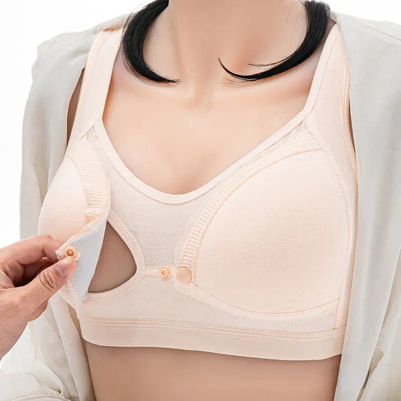 Beige nursing bra with front buckle closure and molded cups