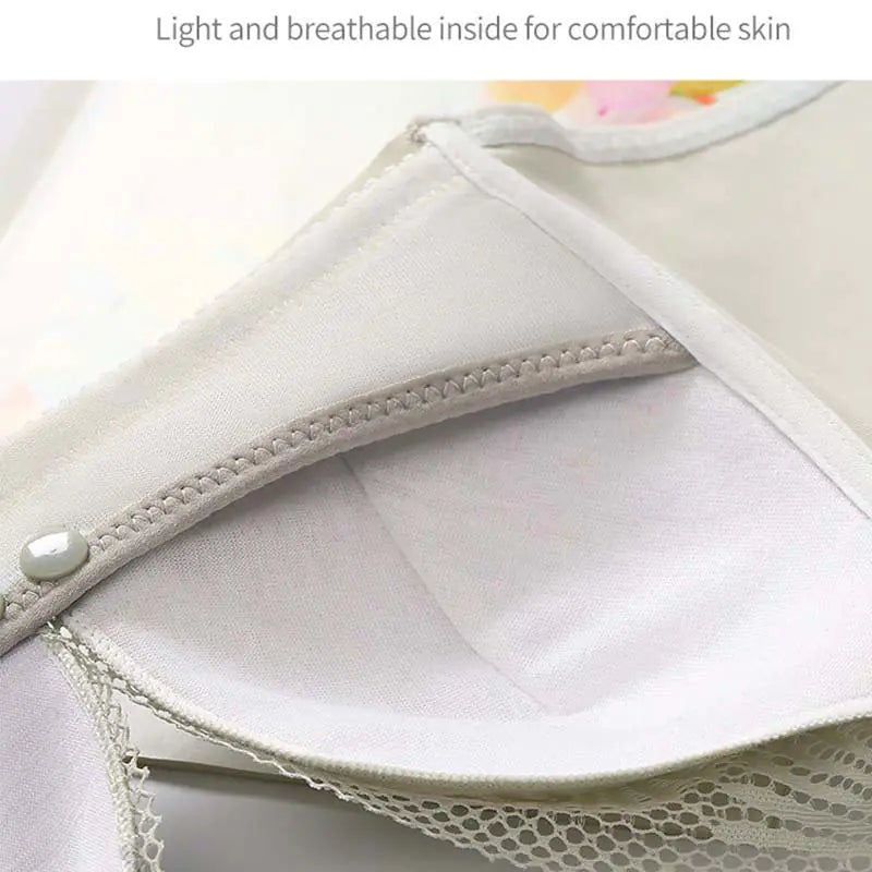 Inside view of a light nursing bra lining with stitched edge and lace trim