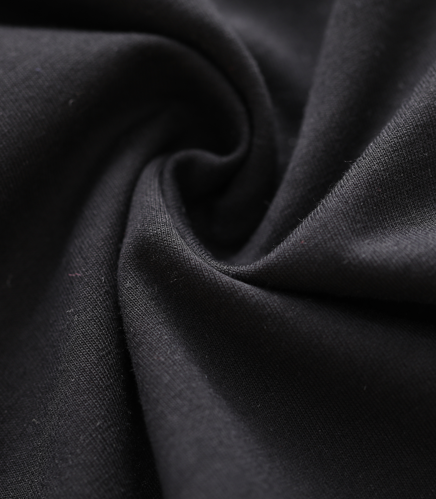 Close-up of dark fabric with folds