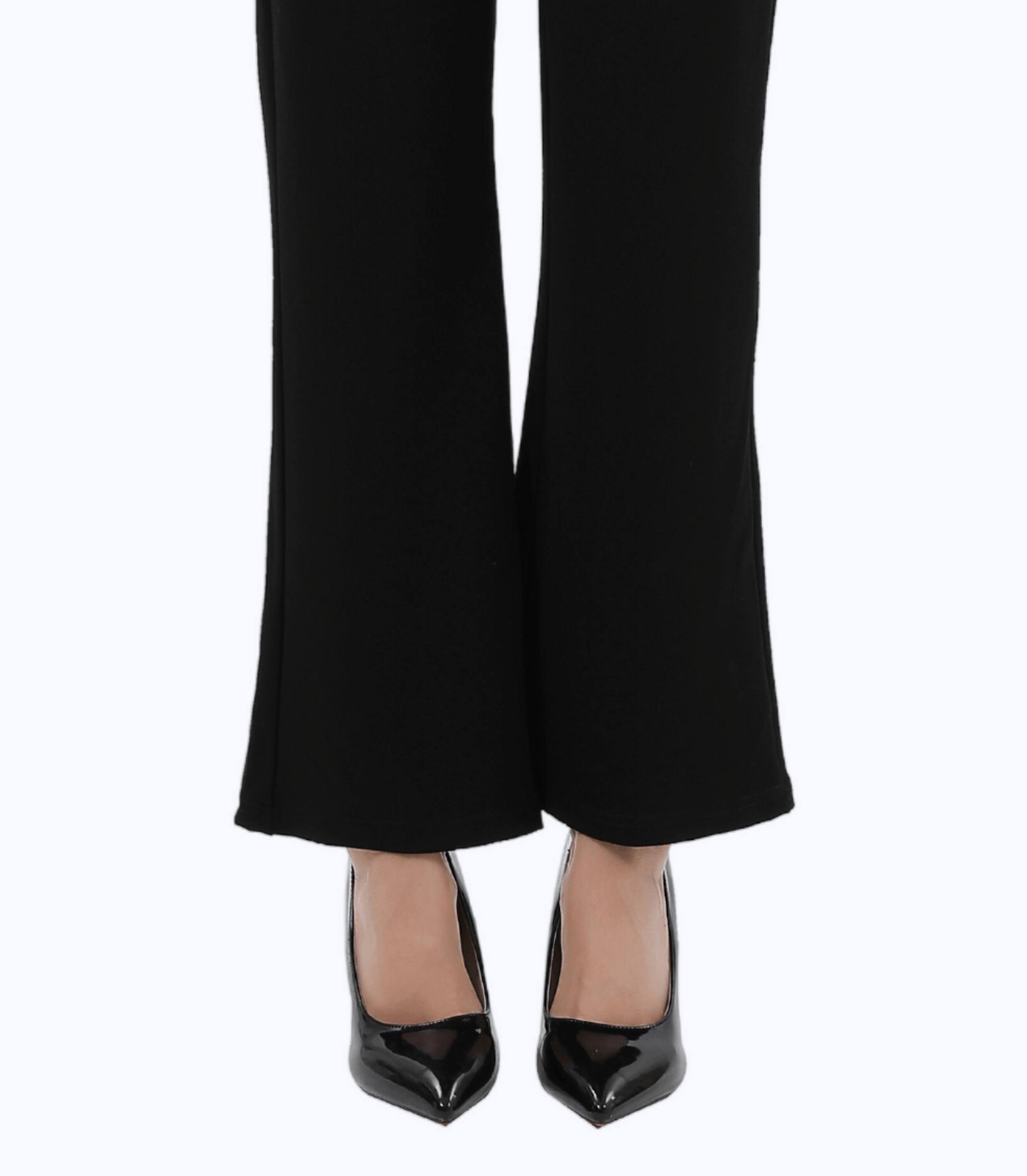 Black pants worn by a person on a white background