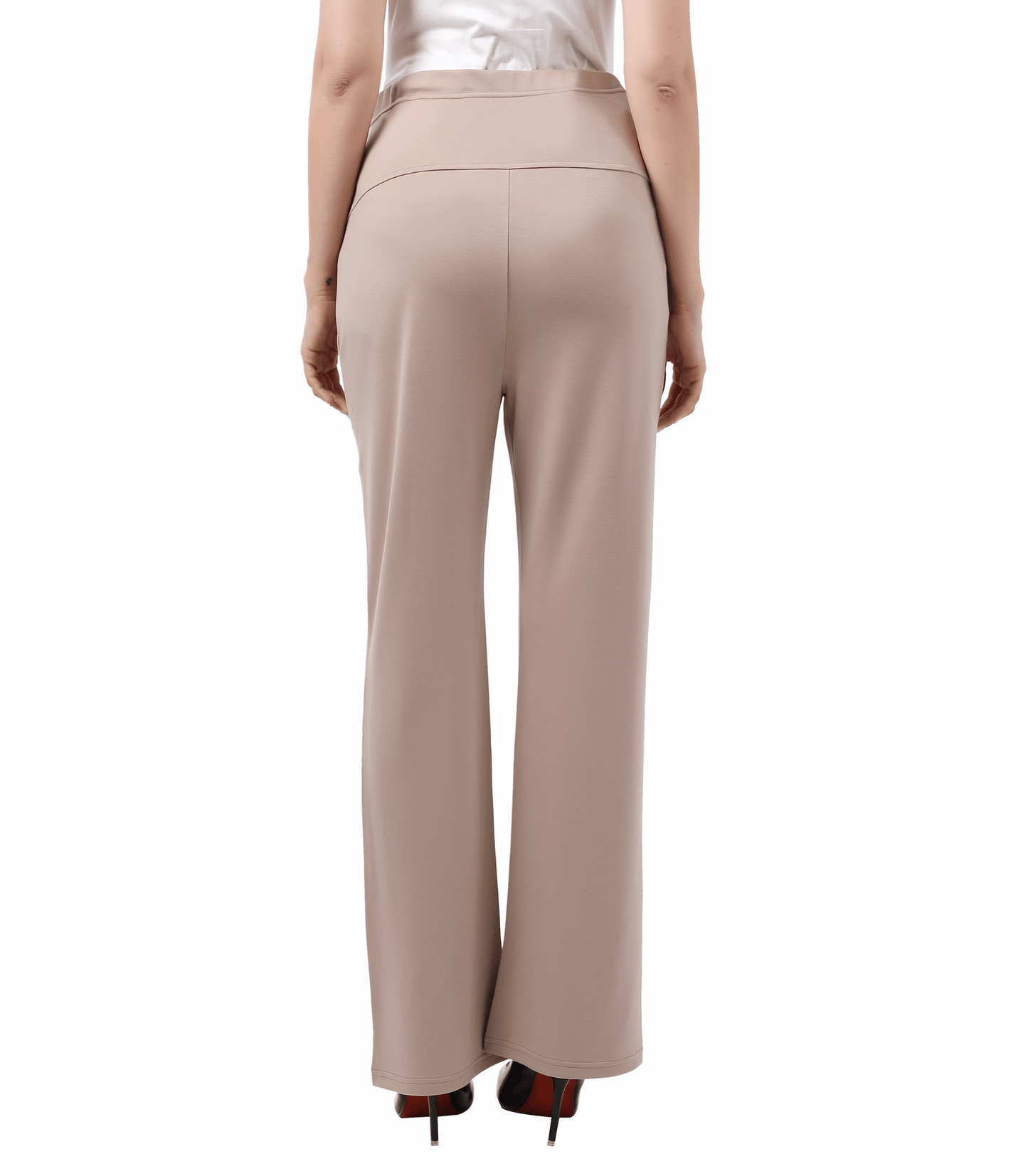 Beige pants worn by a person on a white background
