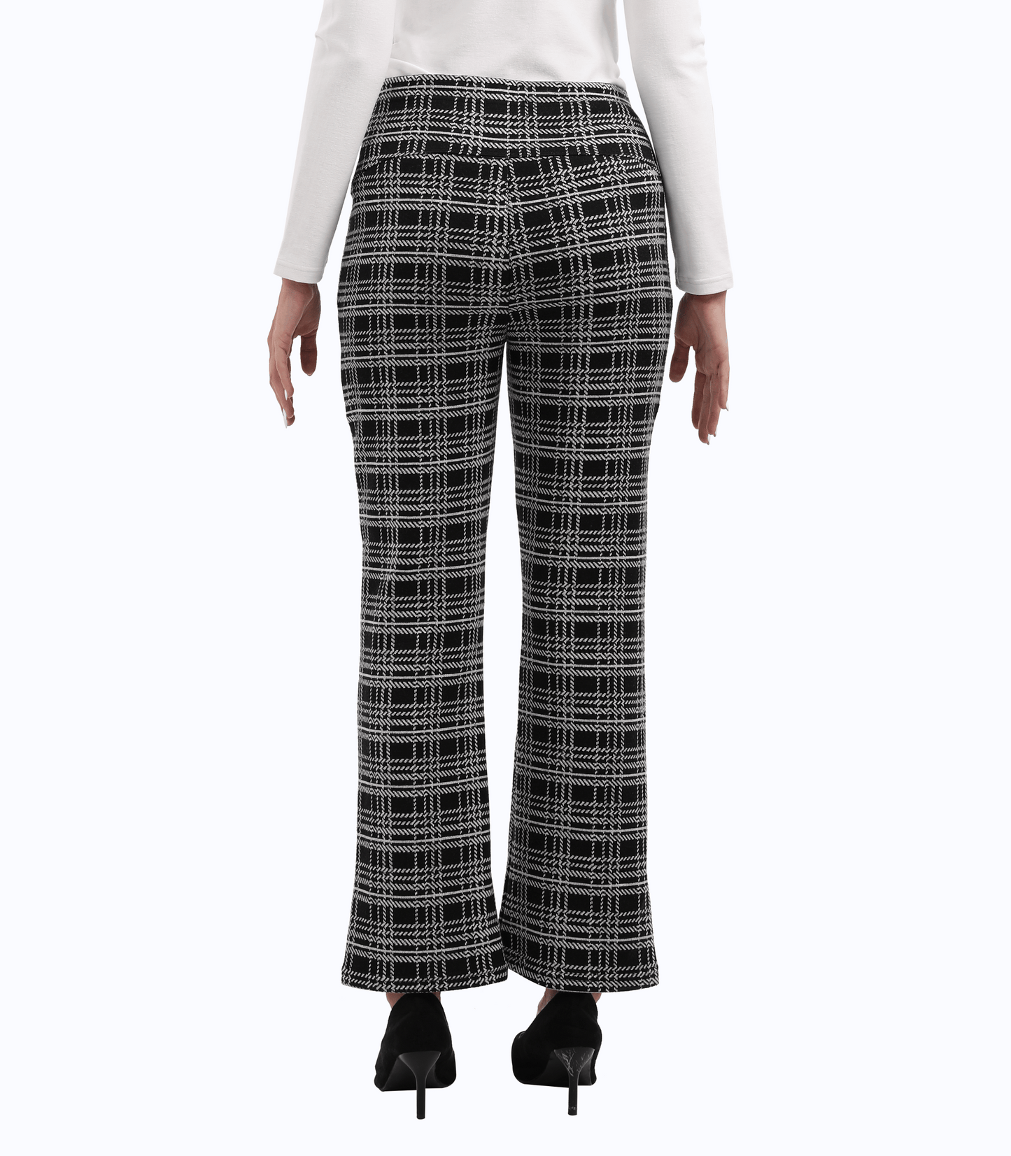 Plaid pants worn by a person on a white background