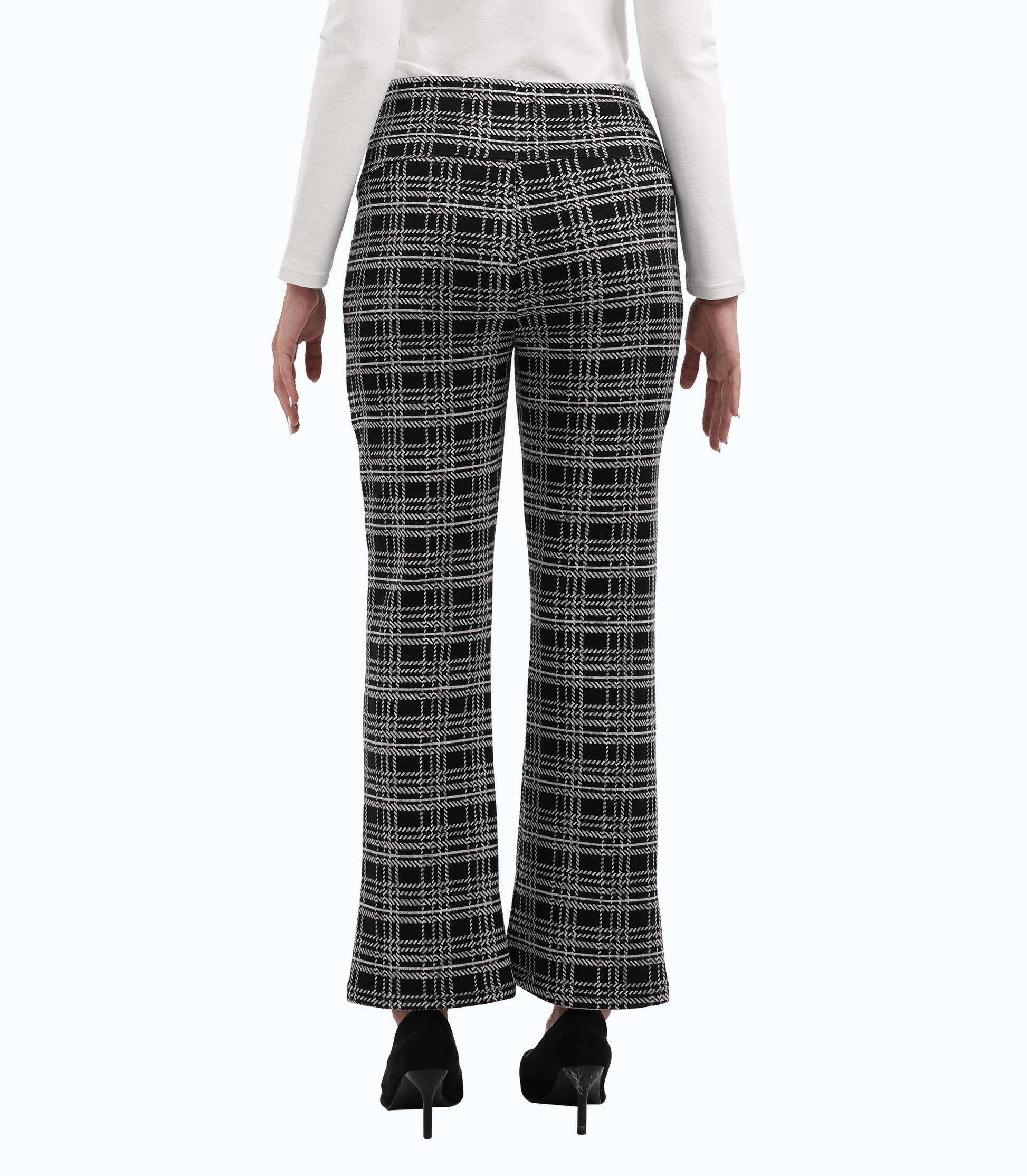 Plaid pants worn by a person on a white background