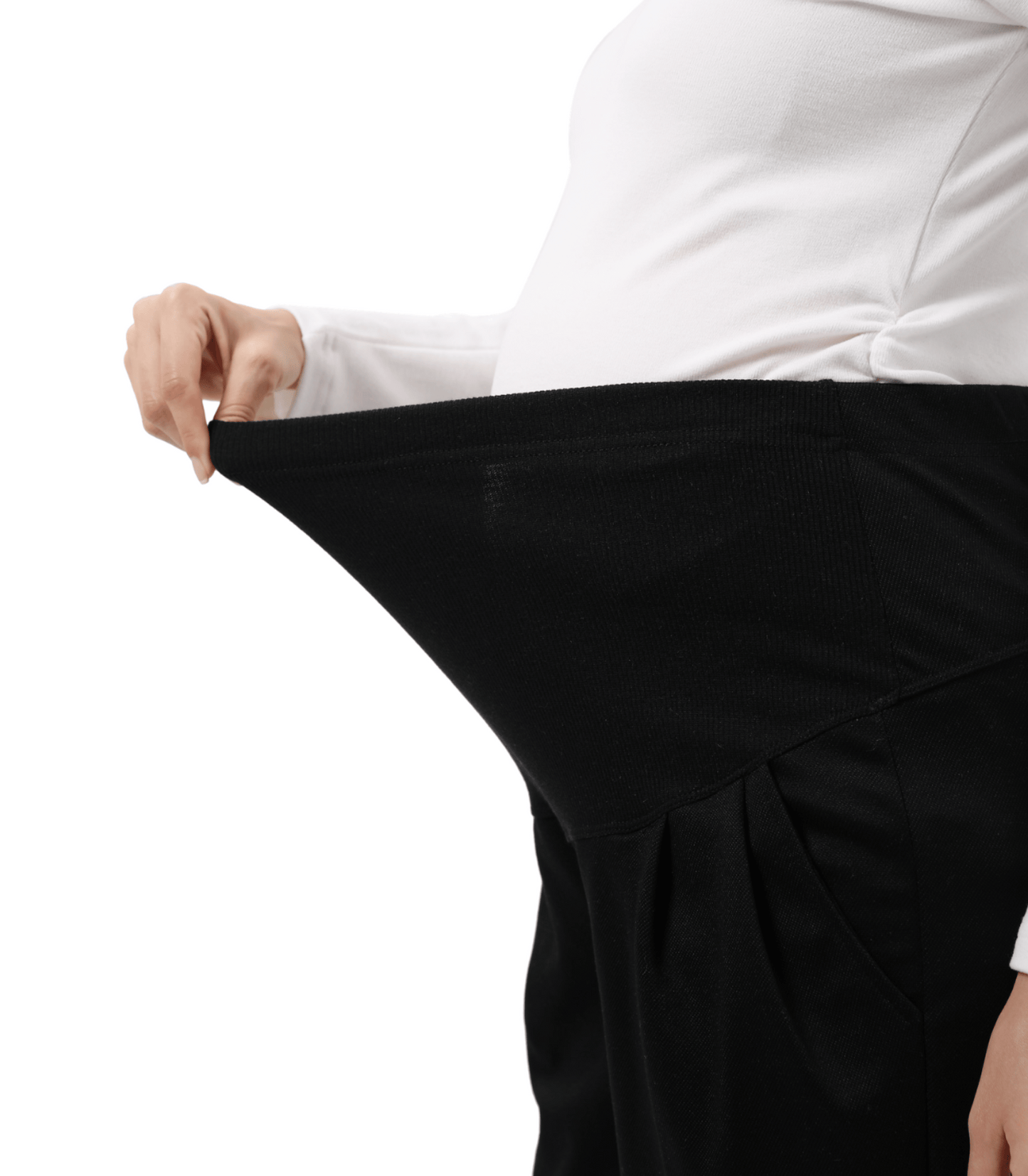 Person wearing a white shirt and black pants on a white background
