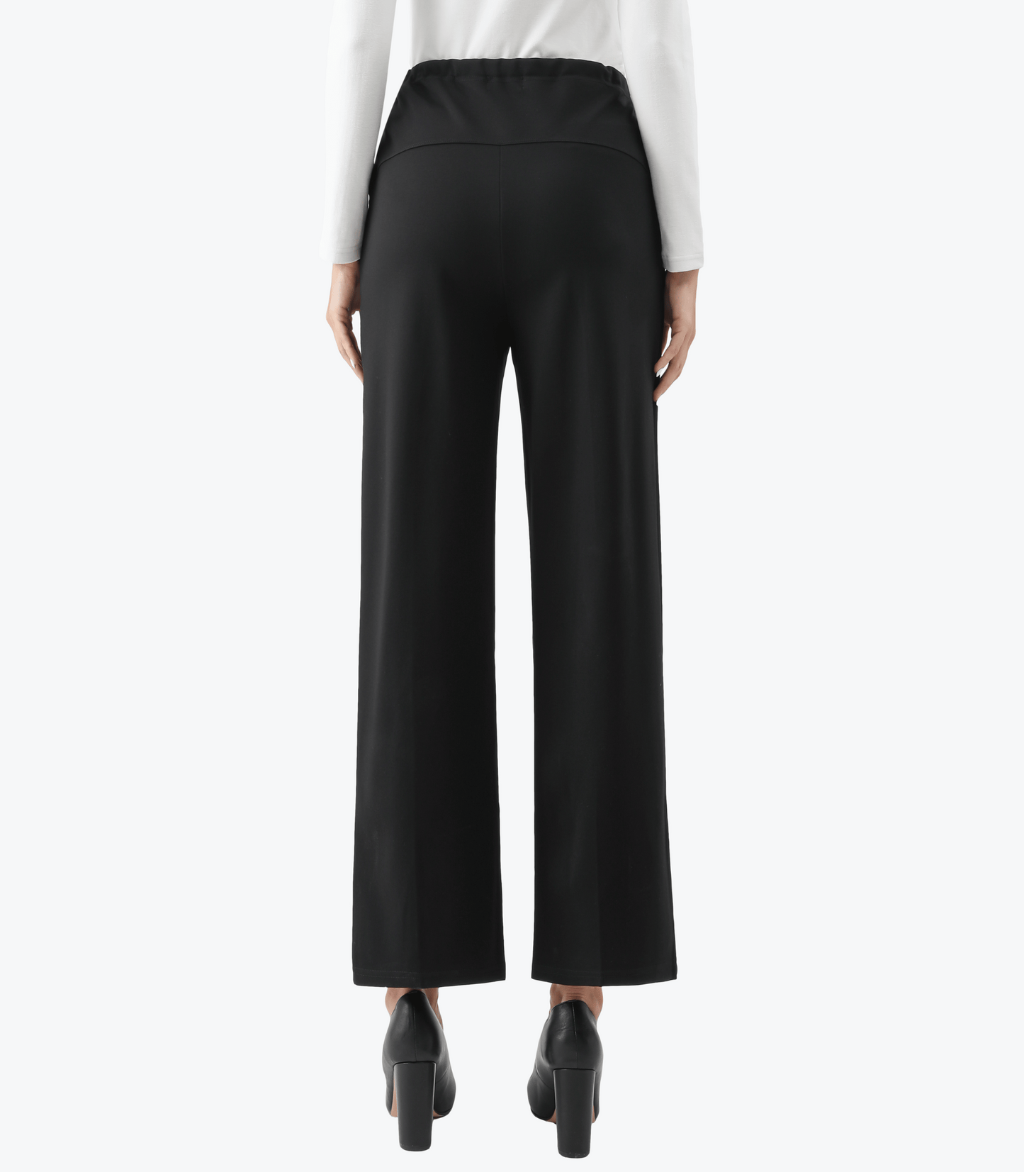 Black wide-leg pants worn by a person on a white background