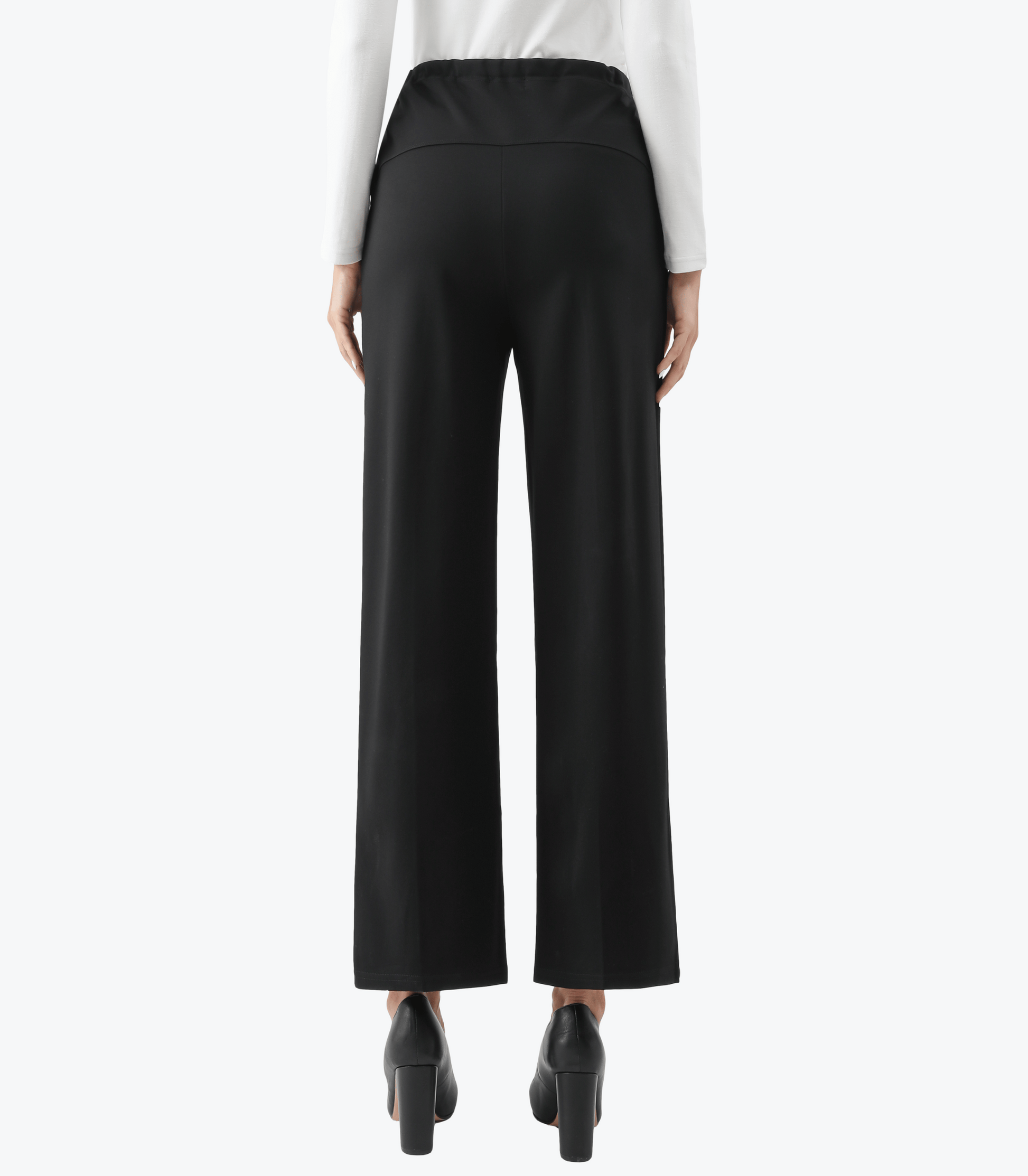 Black wide-leg pants worn by a person on a white background