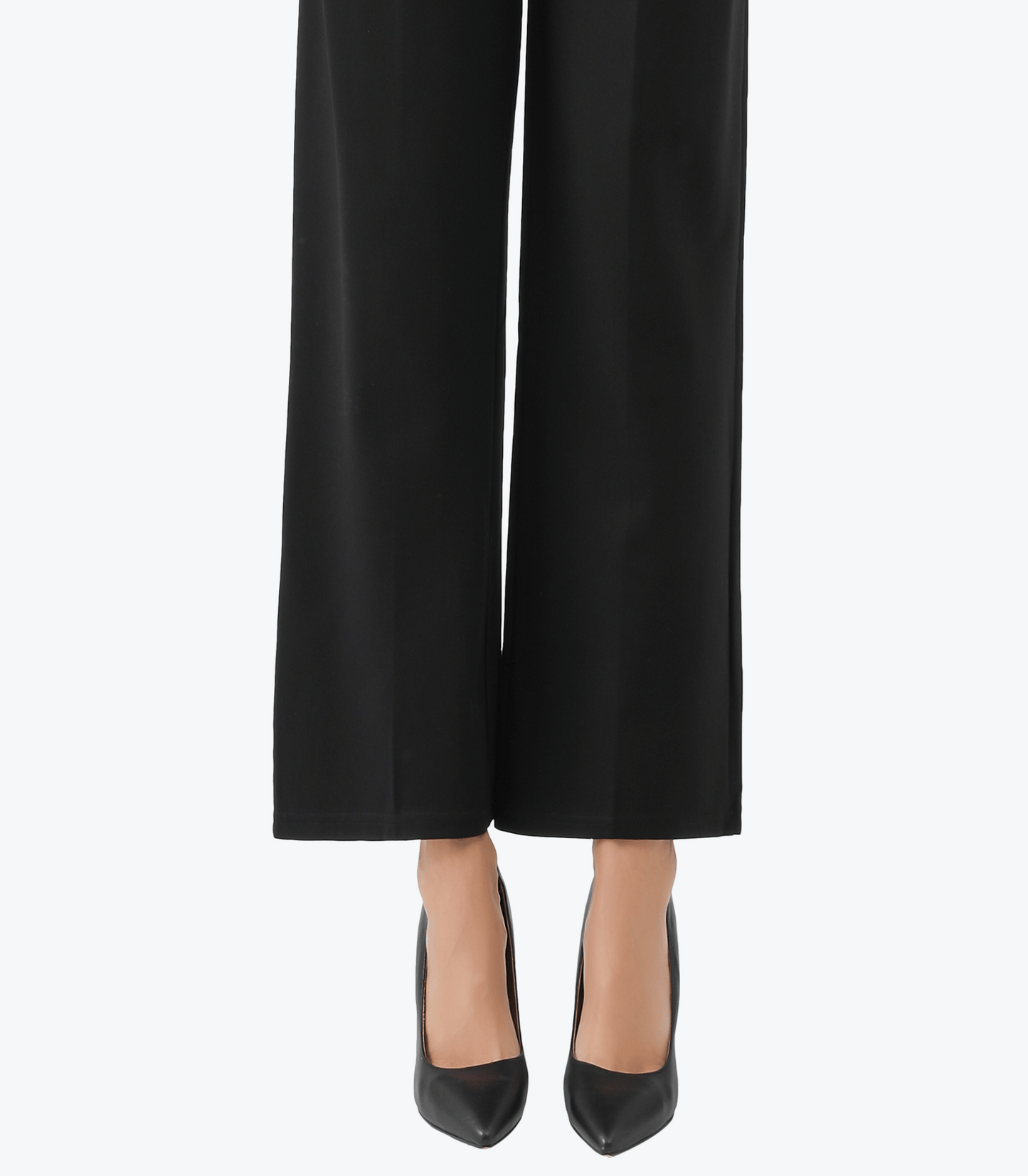 Black wide-leg pants worn by a person on a white background