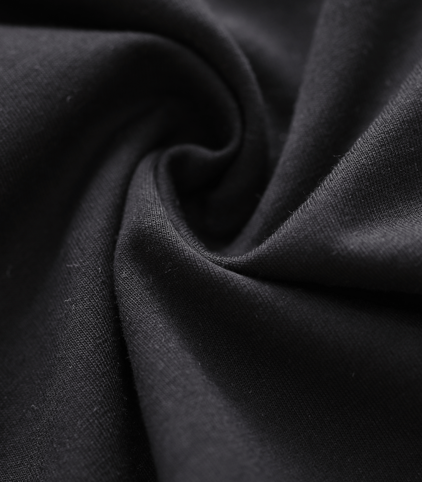 Close-up of dark fabric with folds