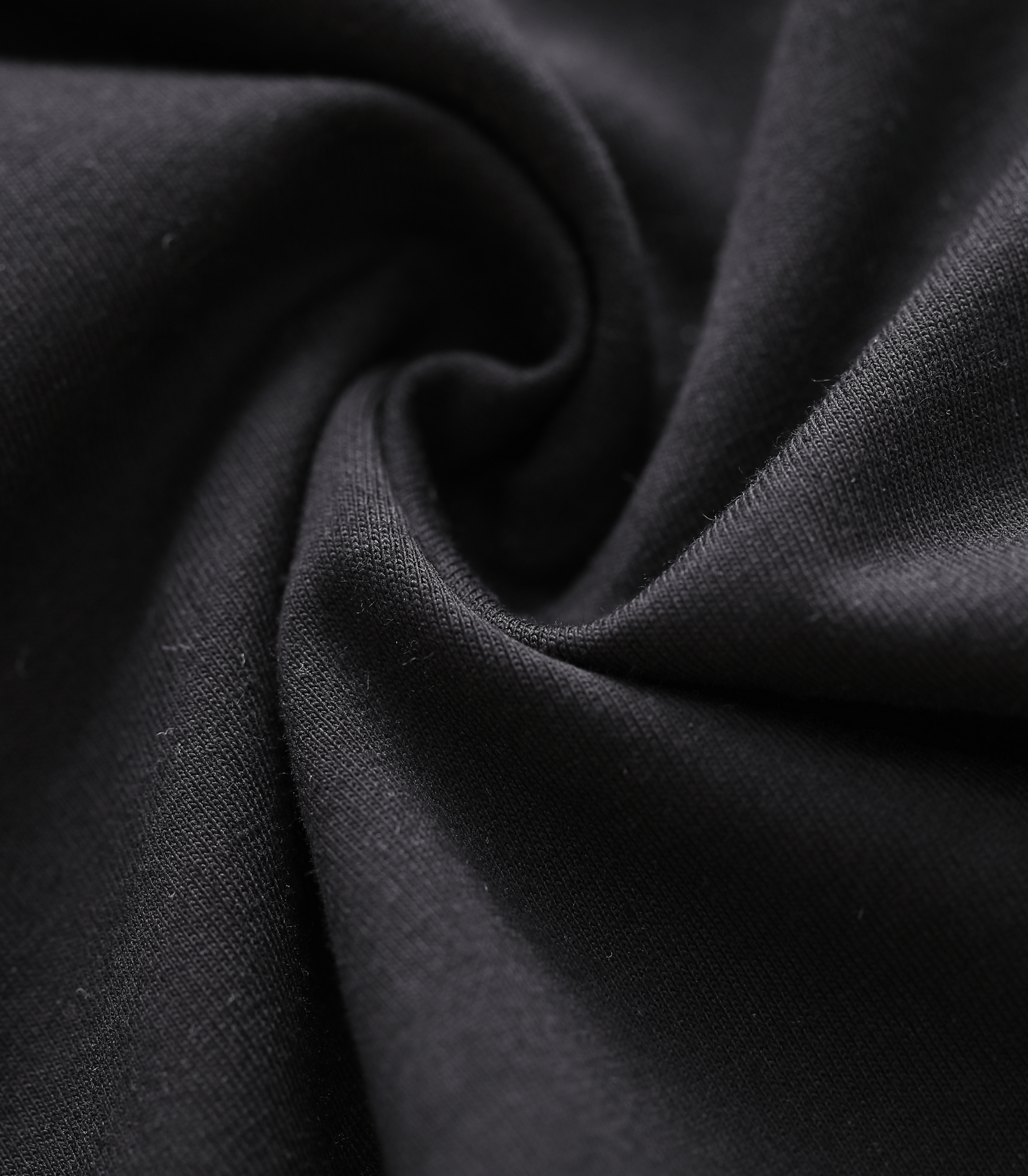 Close-up of dark fabric with folds