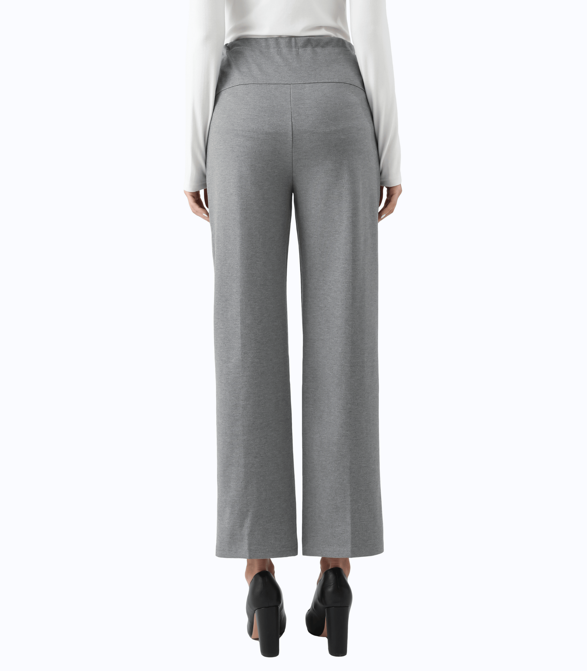Gray wide-leg pants worn with a white top on a white background