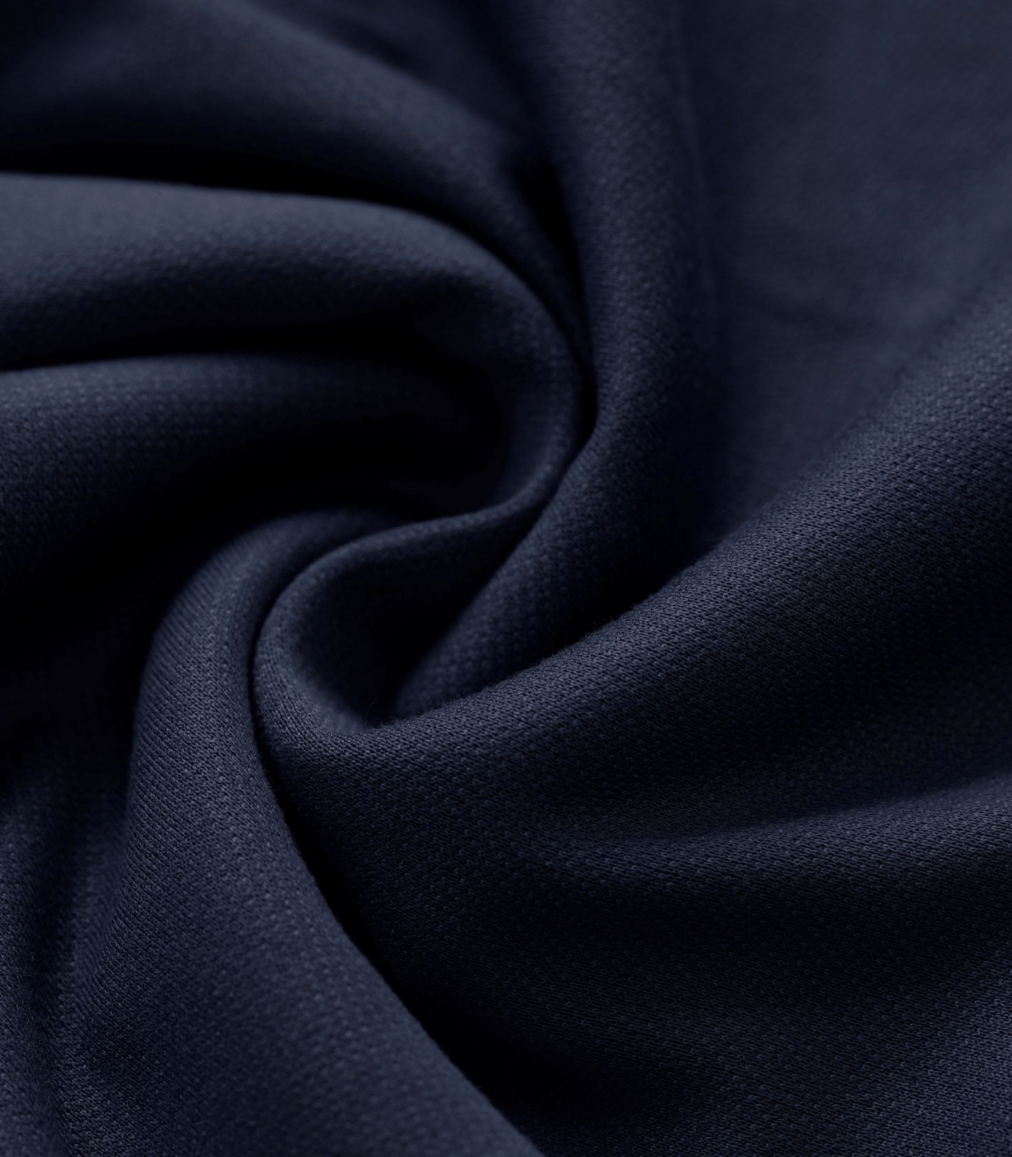 Close-up of dark blue fabric with folds