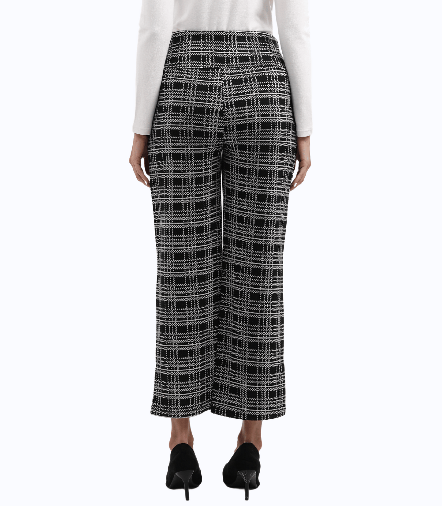 Black and white plaid pants worn by a person on a white background