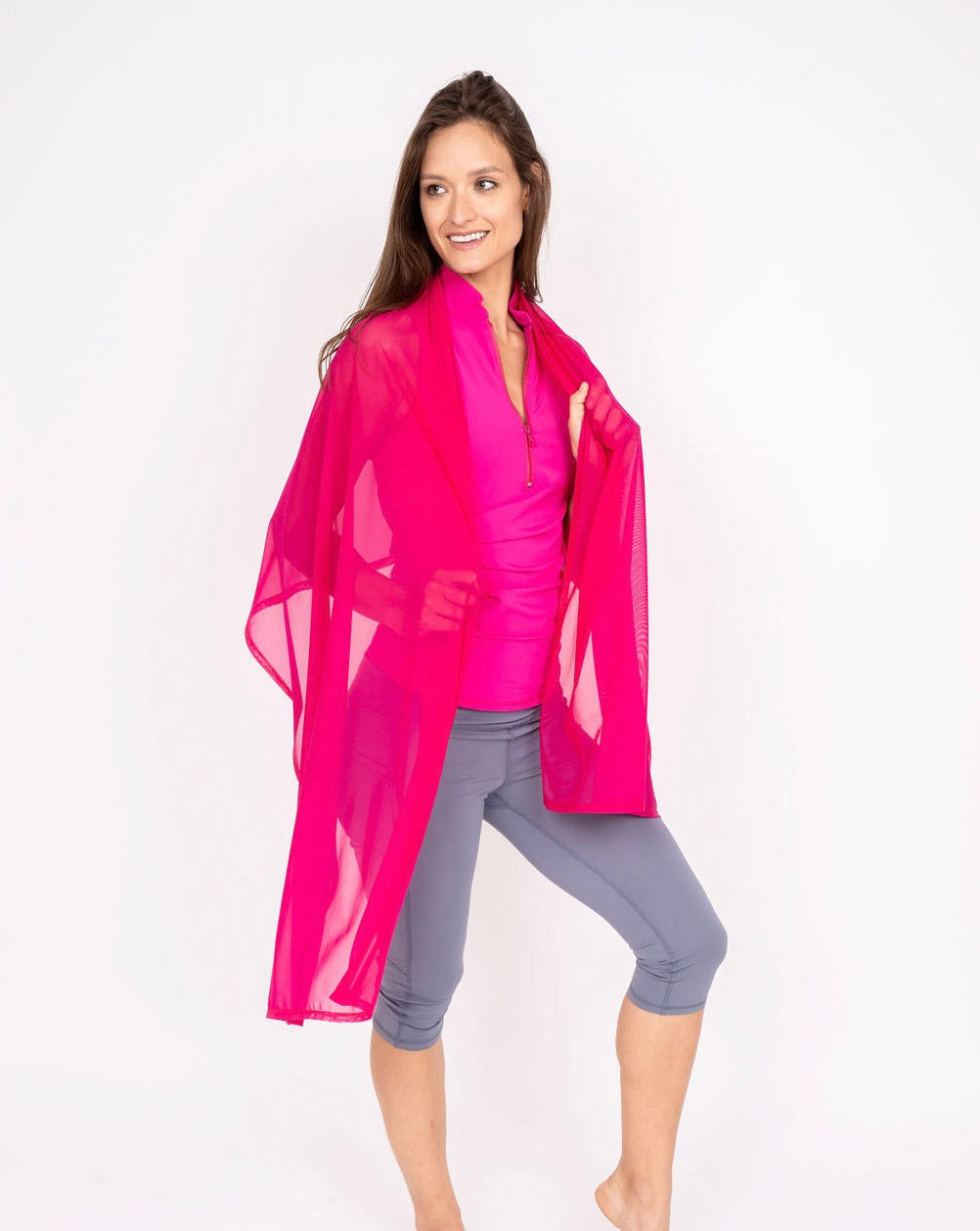 Bright pink mesh sun wrap with long flowing cape panels