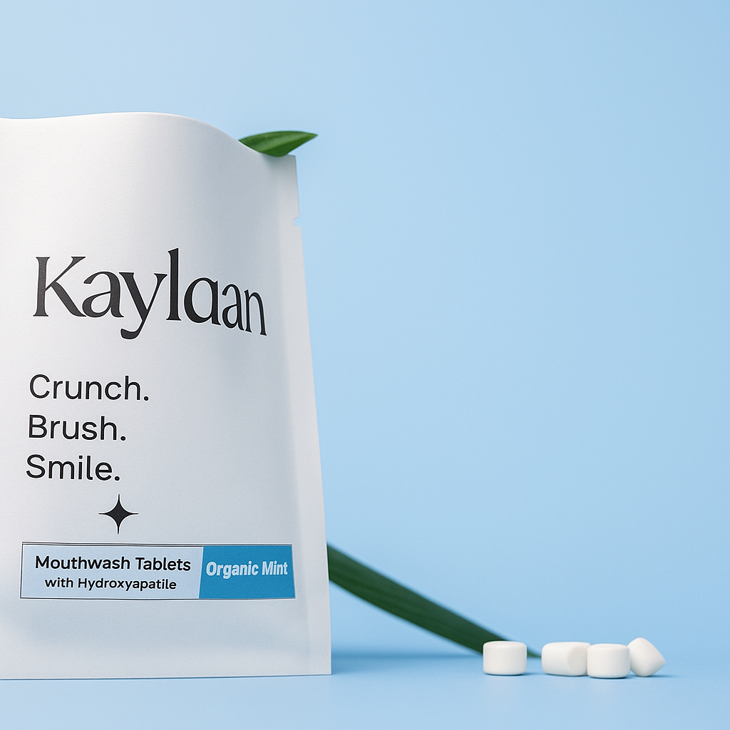 Mouthwash tablet refill pouch with mint label and scattered white tablets
