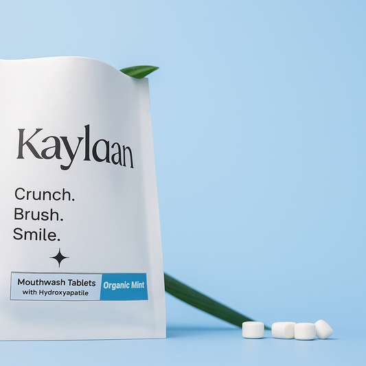 Mouthwash tablet refill pouch with mint label and scattered white tablets