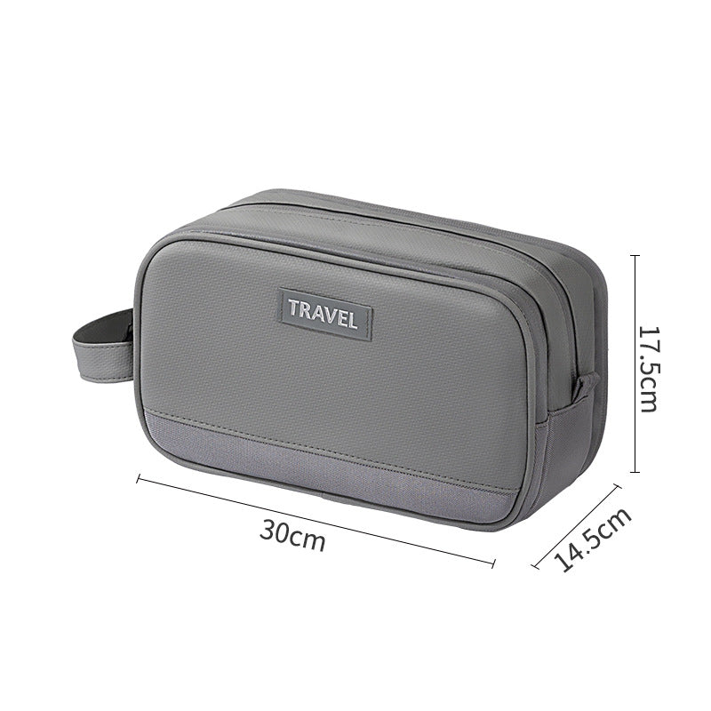 Gray travel toiletry bag with TRAVEL label, textured finish and zipper closure