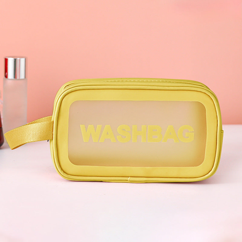 Large translucent frosted PVC wash bag with yellow zipper and strap, WASHBAG print