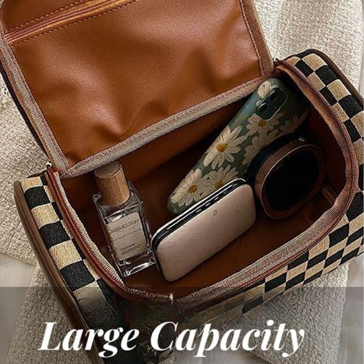 Plaid makeup bag interior with brown lining, elastic loops, and bottle compartments