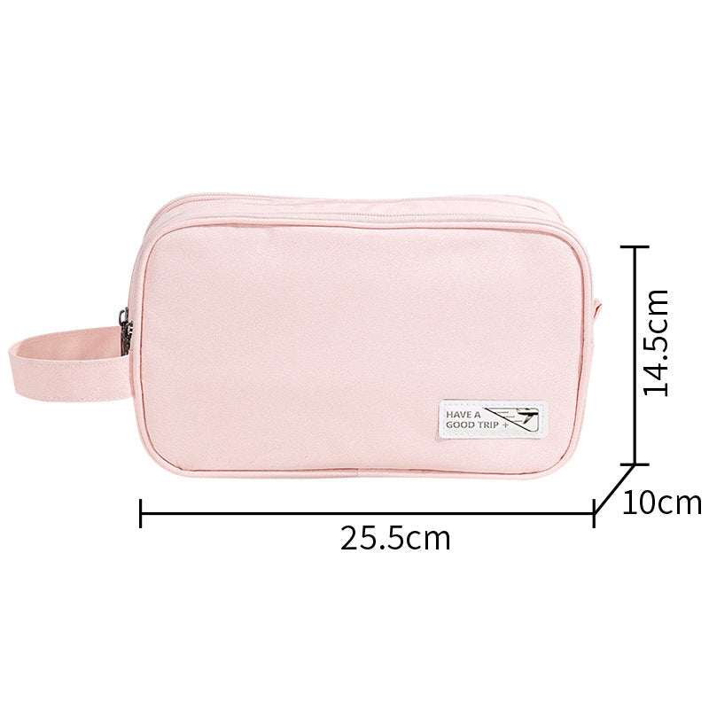 Three-layer travel toiletry bag, pale pink zippered pouch with side handle strap and front label