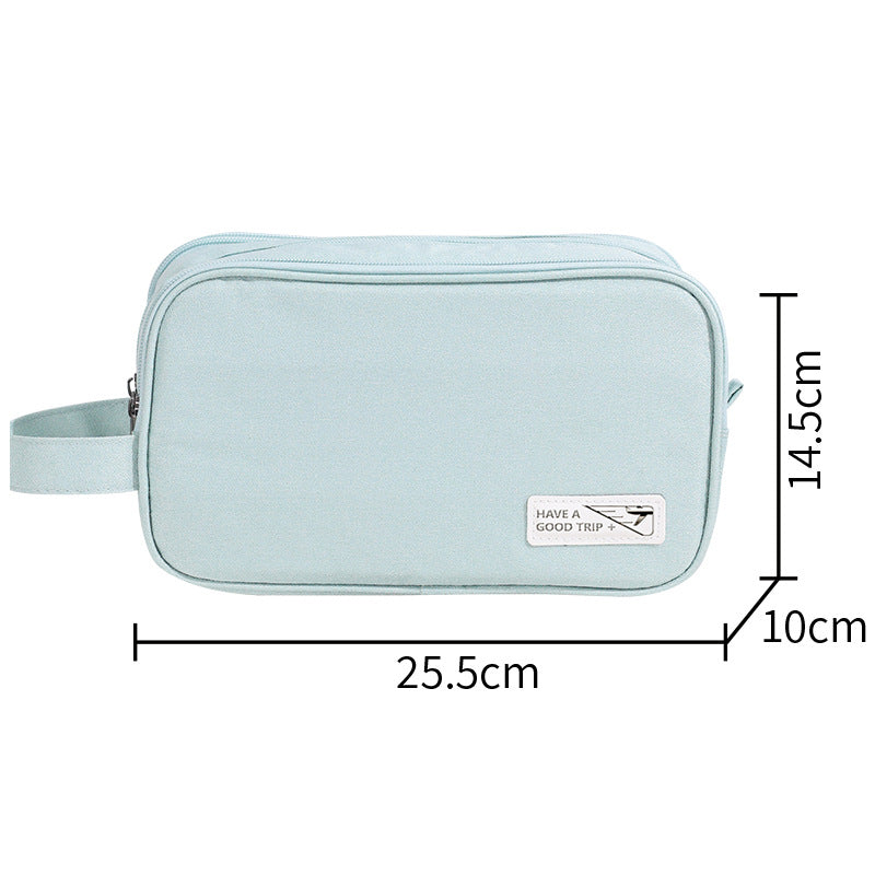 Three-layer travel toiletry bag, light blue zippered pouch with side handle strap and front label