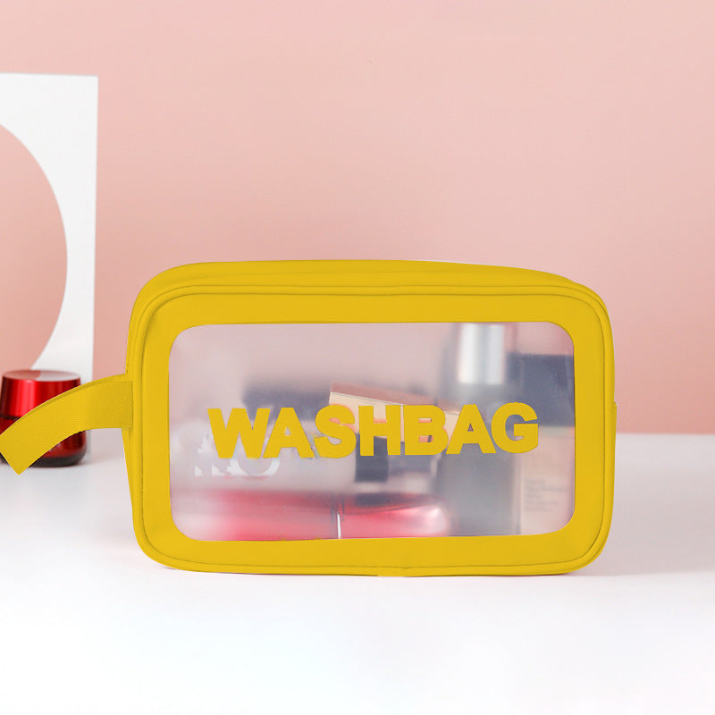 Yellow frosted translucent washbag with zipper, top handle and WAHSBAG print.