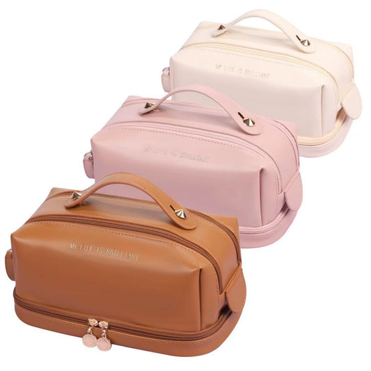 Off-white double-zip makeup bag with top handle, side pocket, and PU leather style