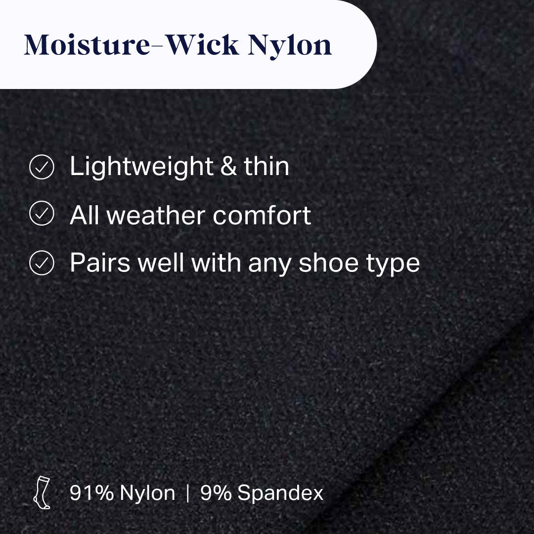 Black compression sock fabric close-up with textured, moisture-wicking knit