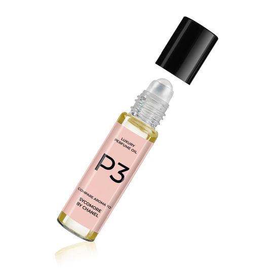 Perfume oil bottle with pink label, clear oil, black cap and dropper
