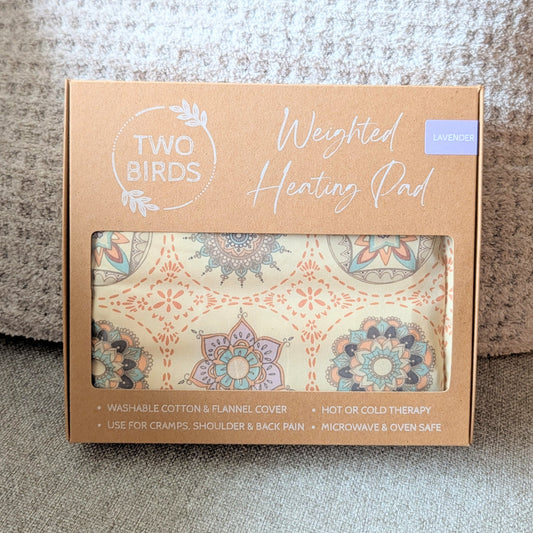 Weighted heating pad gift box with lavender-scent label and floral cotton flannel cover