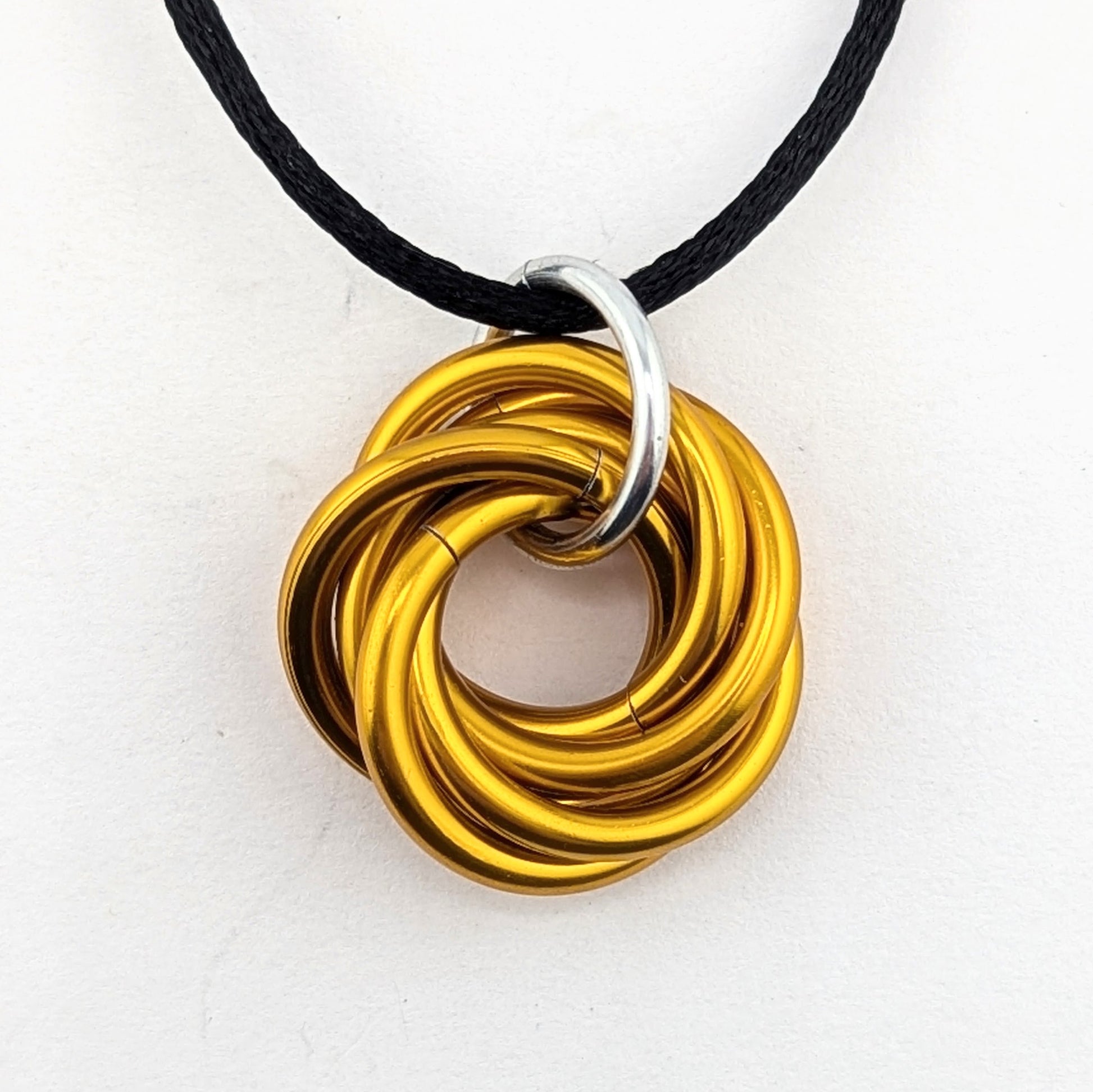 Möbii® "Stay Gold, America": Long Live the American Dream, Stylish Discreet Fidget Fashion Wear: Necklaces, Earrings, Keychains Steel Lynx