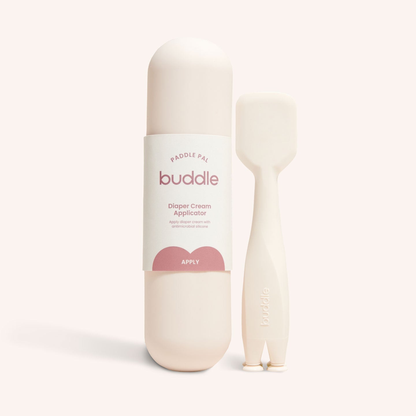 Diaper cream applicator paddle and carrying case, white silicone with pink label