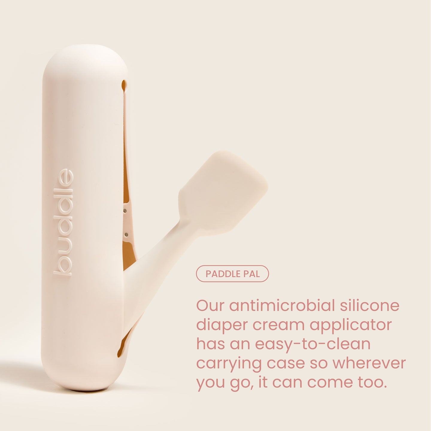 Diaper cream applicator paddle with white carrying case, smooth silicone design