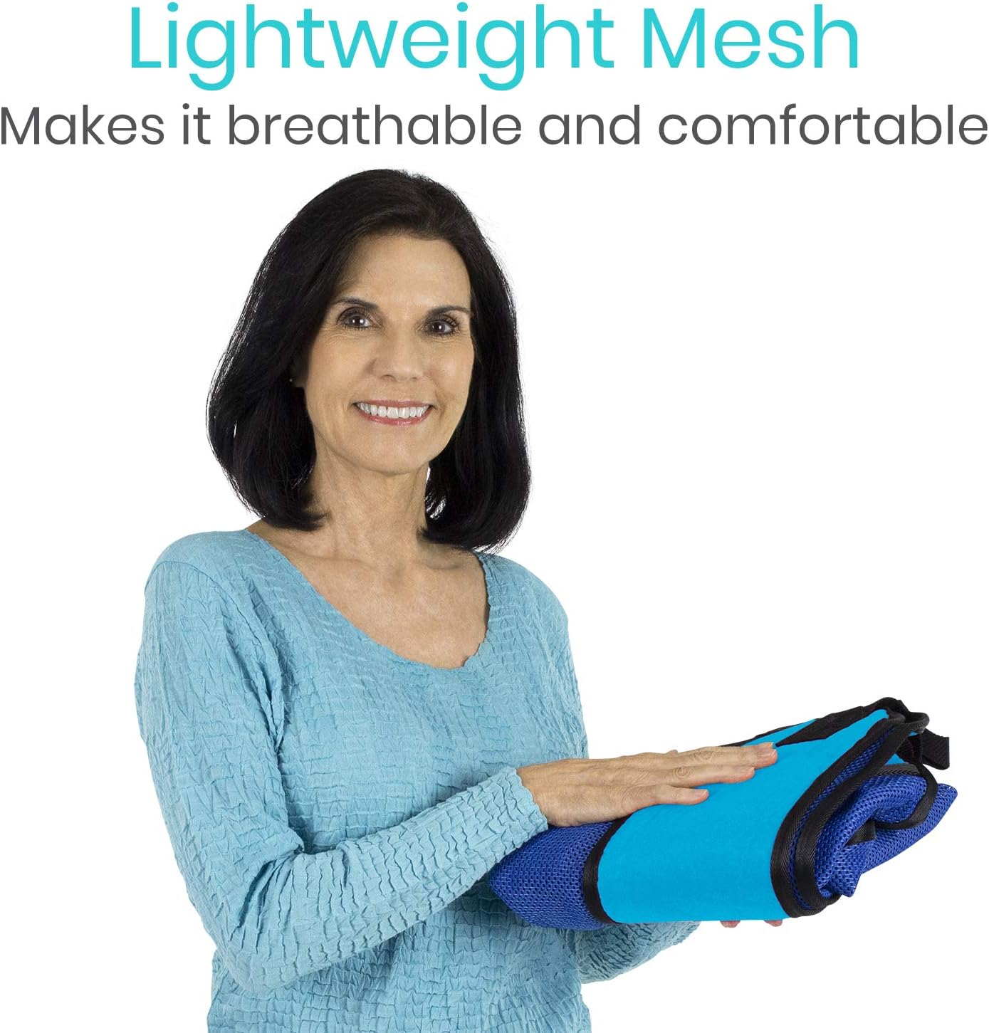 Blue patient lift sling with commode opening, lightweight mesh design, held by a woman